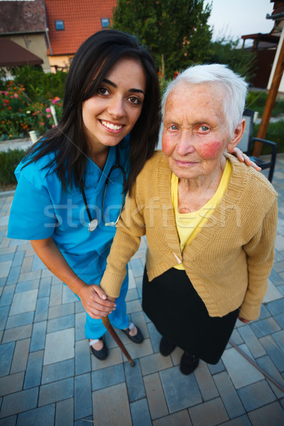 Nővér idős nő gondoskodó orvos tart idős Stock fotó © Lighthunter
