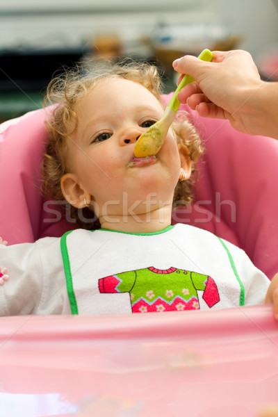 Baby Eating Spinach Stock photo © Lighthunter