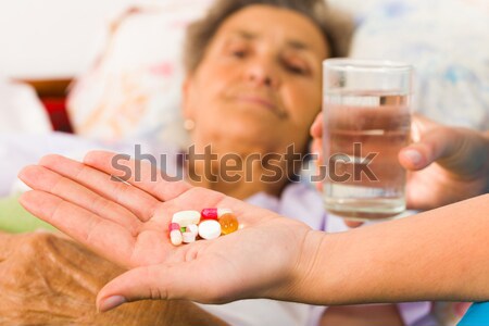 Vecchia giovani medico droga vitamine vetro Foto d'archivio © Lighthunter
