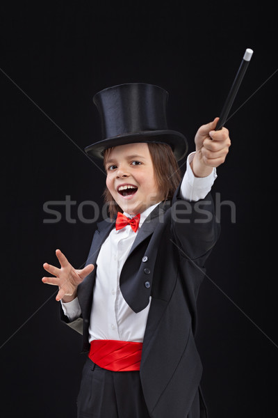 Happy young magician Stock photo © lightkeeper