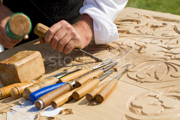 Traditional craftsman carving wood Stock photo © lightkeeper