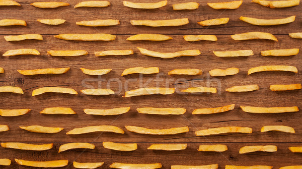炸薯條 棕色 木桌 頂部 視圖 商業照片 © lightkeeper