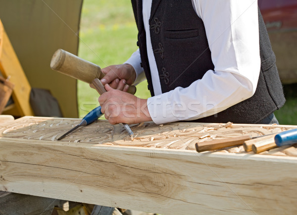 Traditional craftsman carving wood Stock photo © lightkeeper