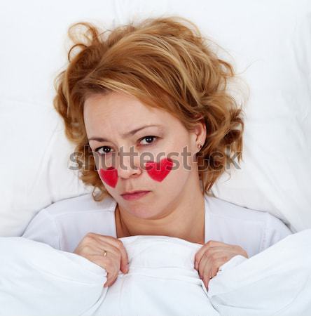 Lovesick woman laying in bed Stock photo © lightkeeper
