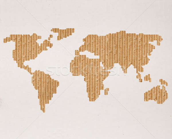 Global shipping concept with cardboard world map Stock photo © lightkeeper