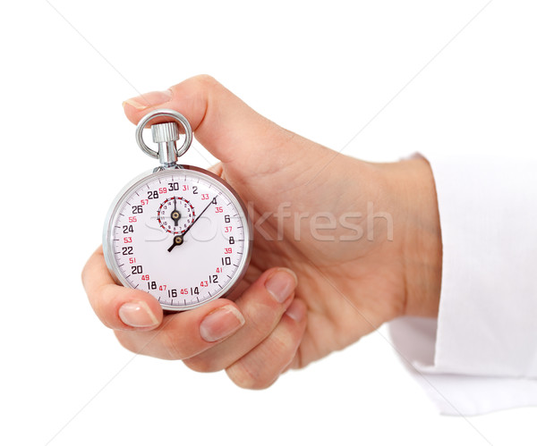 Woman hand with stopwatch Stock photo © lightkeeper