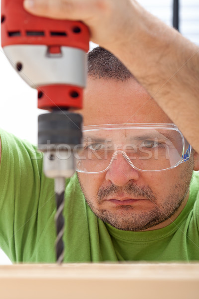 Stock photo: Man drilling wood