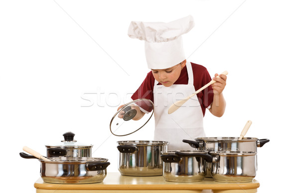 Little chef checking the food Stock photo © lightkeeper