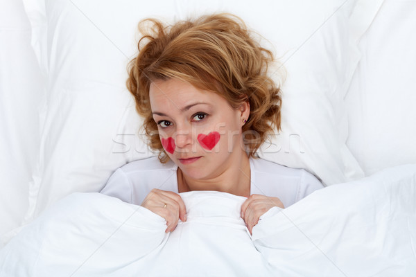 Amor enfermos mujer cama corazón Foto stock © lightkeeper