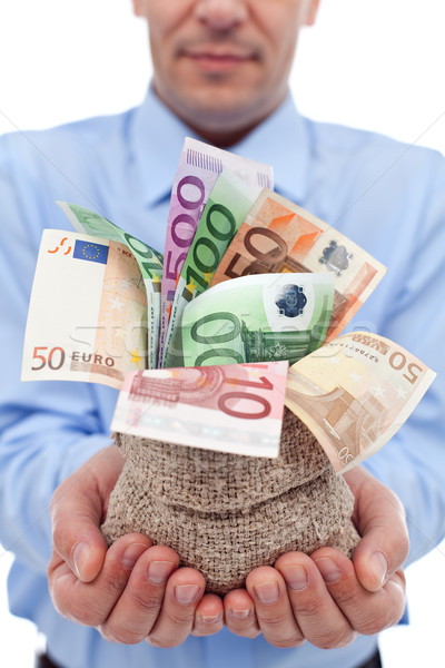 Businessman hands with euro banknotes in a money bag Stock photo © lightkeeper