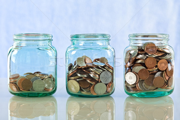Saving money in old jars Stock photo © lightkeeper