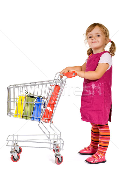 Bambina shopping carrello colorato borse ragazza Foto d'archivio © lightkeeper