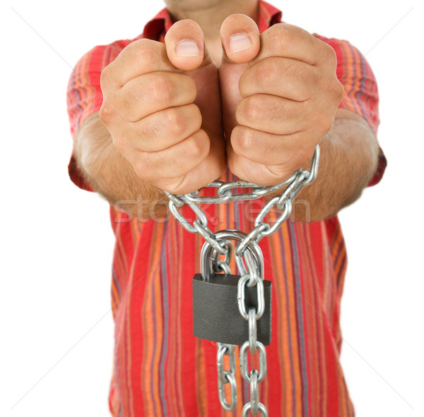 Man in chains - closeup, focus on hands Stock photo © lightkeeper