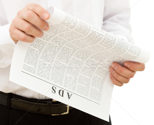 Man reading ads from the paper Stock photo © lightkeeper