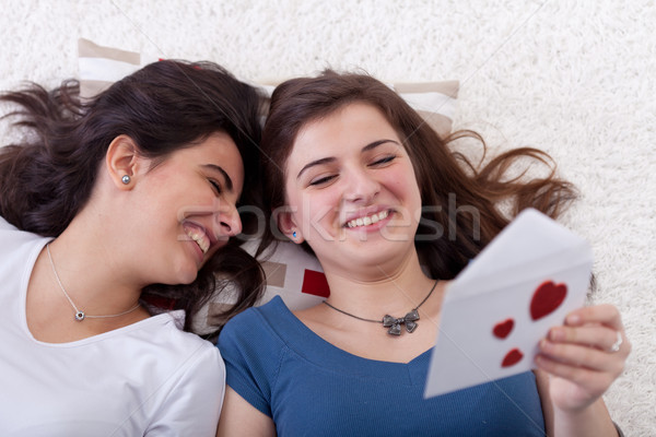 Young teenagers reading love letter Stock photo © lightkeeper