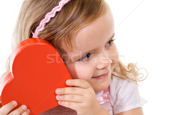 Little girl checking a present Stock photo © lightkeeper