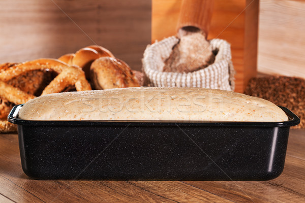 Bread dough leaven in baking mold Stock photo © lightkeeper