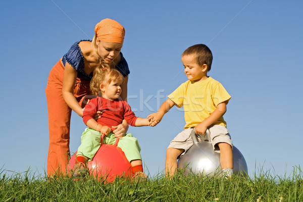 Family outdoors playing together Stock photo © lightkeeper