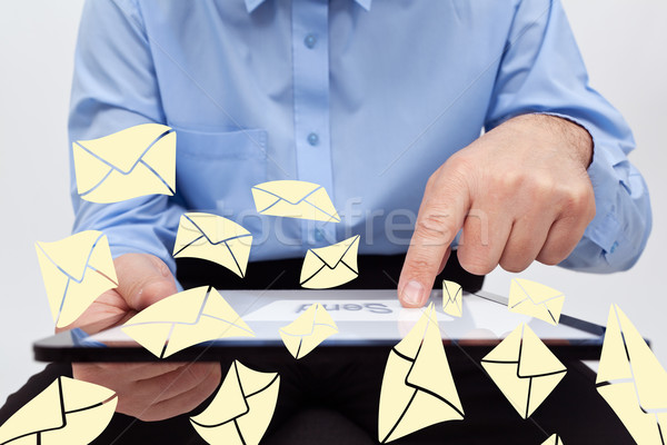 Om de afaceri electronic poştă comprimat Imagine de stoc © lightkeeper