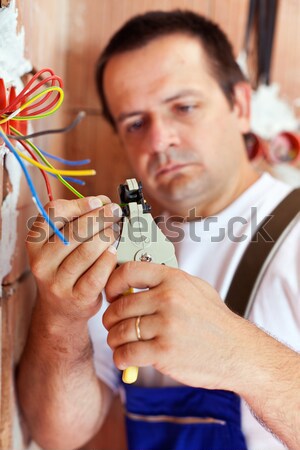 Stock photo: Installing electricity in a new building