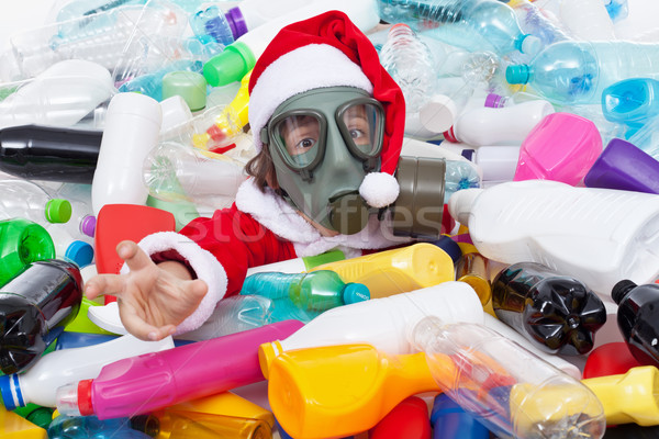 Toxic christmas - santa drowning in plastic bottles Stock photo © lightkeeper