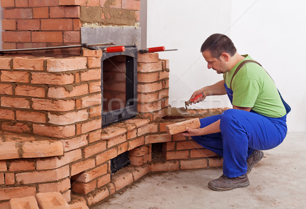 Stock foto: Arbeitnehmer · Gebäude · Mauerwerk · Heizung · Feuer