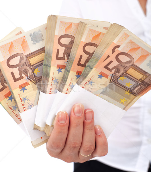 Euro stacks in woman hand Stock photo © lightkeeper