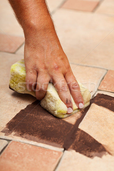 Testing the color of joint on ceramic floor tiling Stock photo © lightkeeper