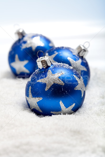Three blue christmas balls in snow Stock photo © lightkeeper