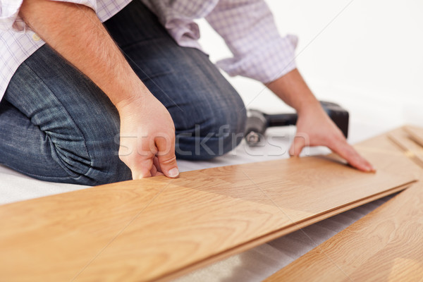 Laying laminate flooring - closeup Stock photo © lightkeeper