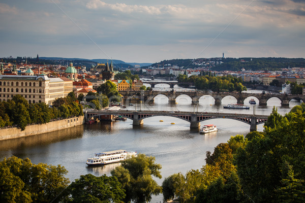 Prague with its splendid bridges over the Vltava river, city sun Stock photo © lightpoet