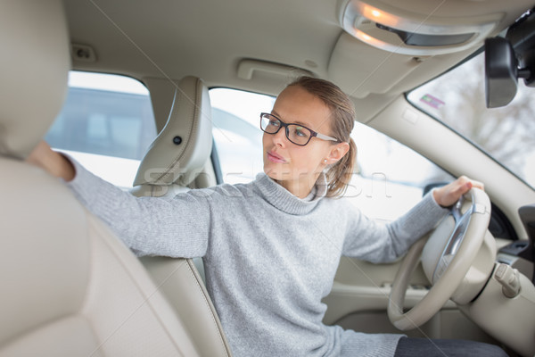Woman driving a car - female driver at a wheel of a modern car,  Stock photo © lightpoet