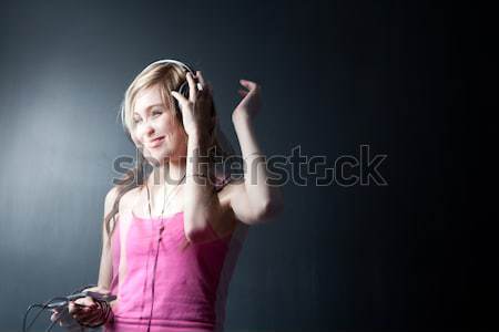 Music please! - Portrait of a pretty young woman/teenager Stock photo © lightpoet