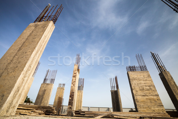 Construction site - Pillars of a building in the making against  Stock photo © lightpoet