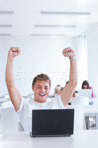 Portré boldog fiatal férfi főiskolai hallgató dolgozik Stock fotó © lightpoet