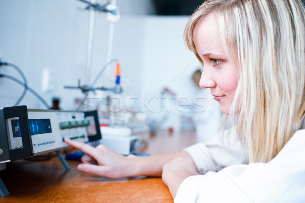 Closeup of a female researcher/chemistry student Stock photo © lightpoet