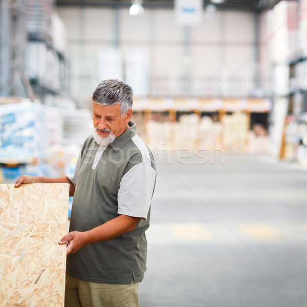 Stock photo: Man buying construction wood in a  DIY store 