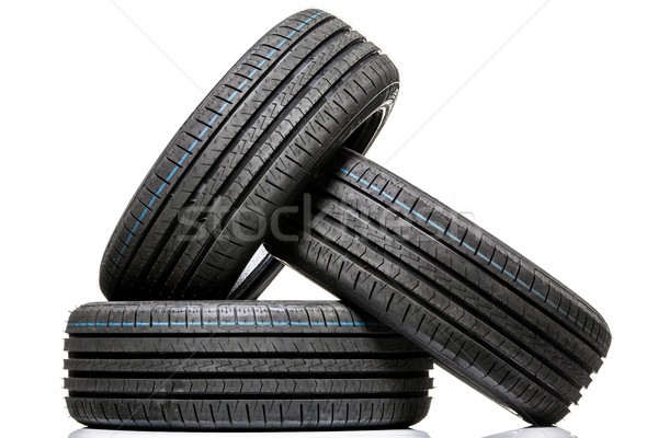 Stack of brand new high performance car tires on clean high-key  Stock photo © lightpoet