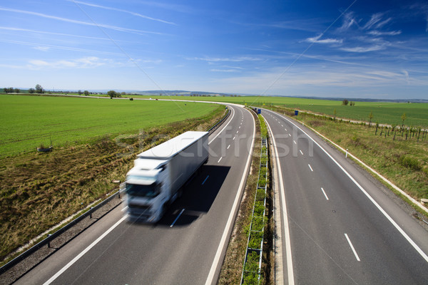Stock photo: highway traffic on a lovely, sunny summer day