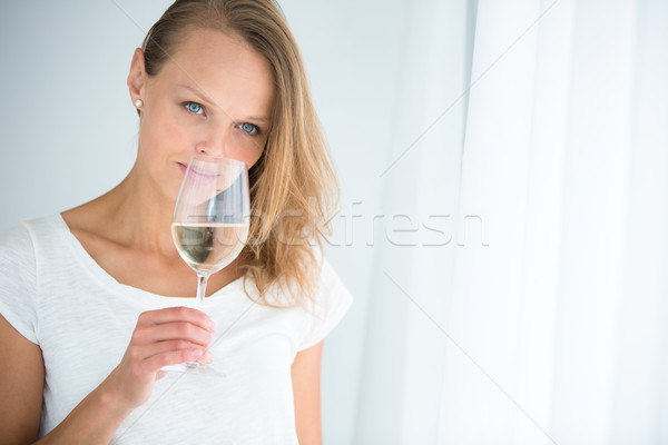 Gorgeous young woman with a glass of wine Stock photo © lightpoet