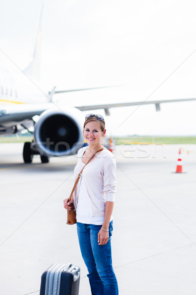young woman at an airport having just left the aircraft Stock photo © lightpoet