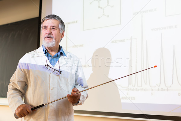 Stock photo: Senior chemistry professor giving a lecture