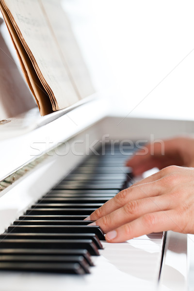 Stock photo: Playing Piano