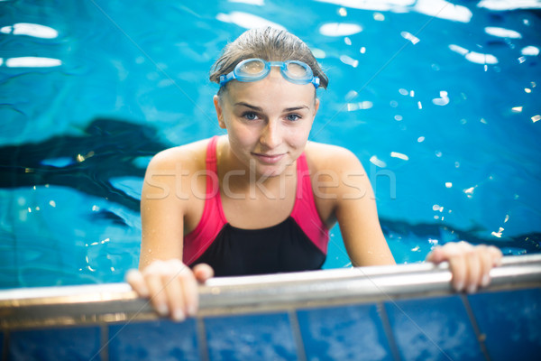 Female swimmer in an indoor swimming pool Stock photo © lightpoet