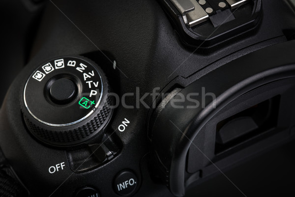Professional modern DSLR camera - detail of the top LCD with set Stock photo © lightpoet