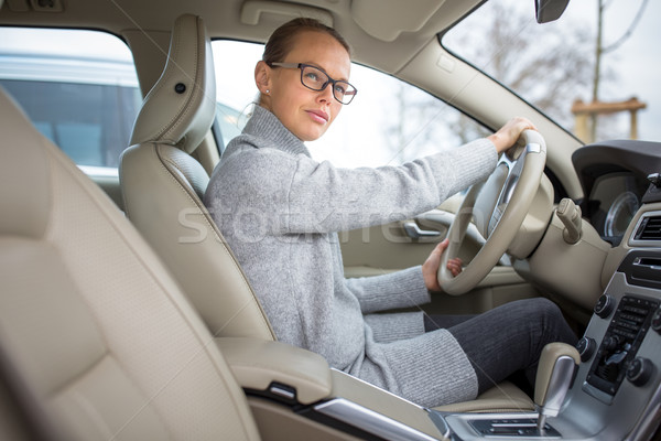 Woman driving a car - female driver at a wheel of a modern car,  Stock photo © lightpoet