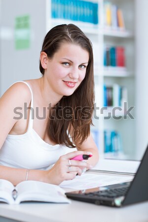 pretty young woman using a copy machine (shallow DOF; color tone Stock photo © lightpoet