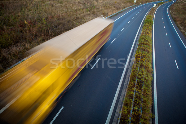 Autostrady ruchu ruchu zamazany ciężarówka zmierzch Zdjęcia stock © lightpoet