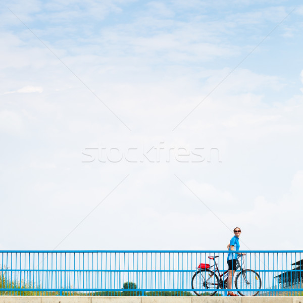 Poszter reklám biciklizik tevékenységek női kerékpáros Stock fotó © lightpoet