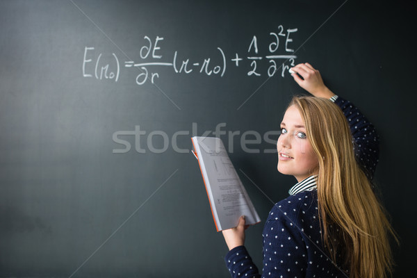 Bastante jóvenes escrito matemáticas clase Foto stock © lightpoet